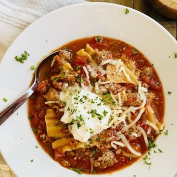 bowl of lasagna soup with ricotta cheese