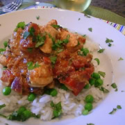 Chicken tikka masala served over rice.
