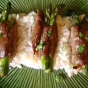 Steak rolls with asparagus and scallions.