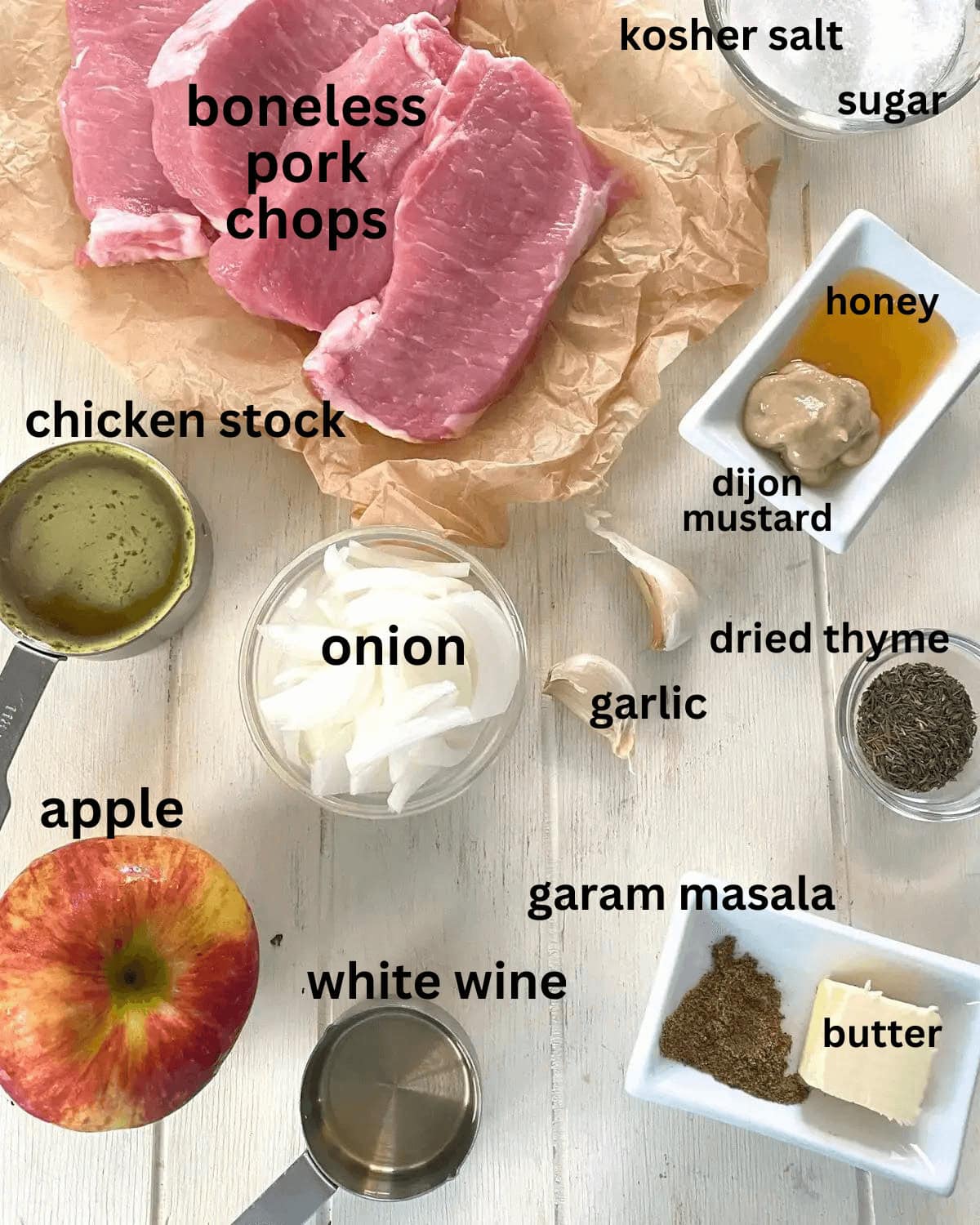 pork chops, apple, onion, butter, salt, mustard, chicken stock.