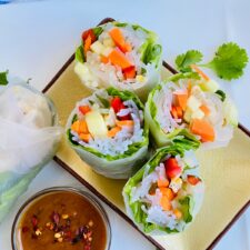 Fresh vegetables in rolls cut in half.