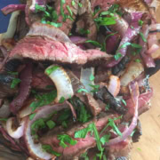 Grilled skirt steak with a balsamic steak marinade.