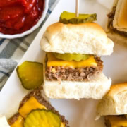 a cheeseburger slider with dill pickle chip