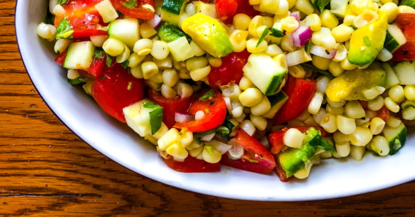 summer salad with corn and avocado and a sherry vinaigrette