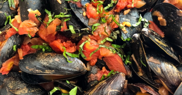 mussels cooked in a light marinara sauce