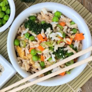 bowl of fried rice with chicken and broccoli