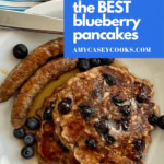 stack of blueberry pancakes with breakfast sausage