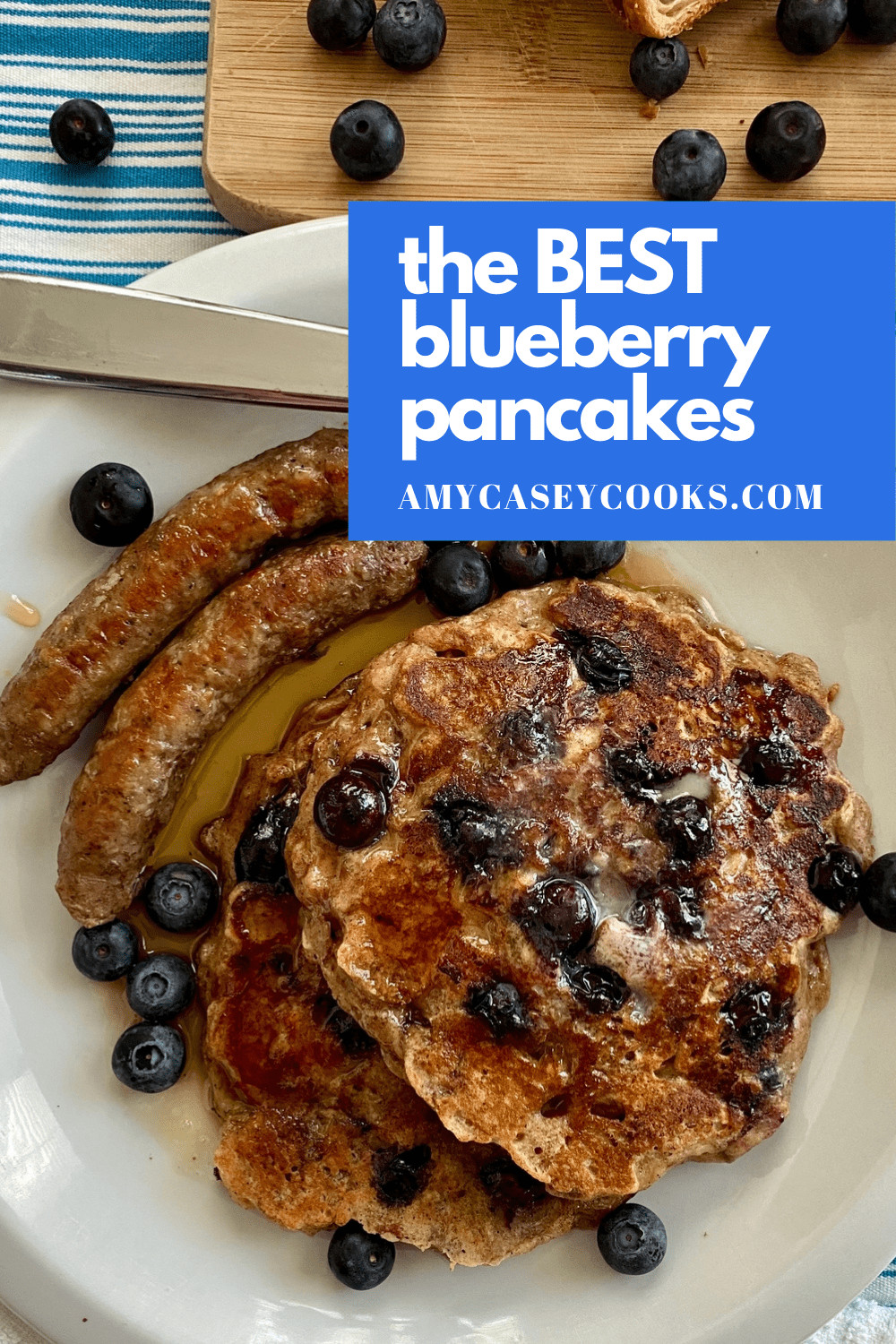stack of blueberry pancakes with breakfast sausage