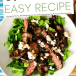 steak salad on a plate.