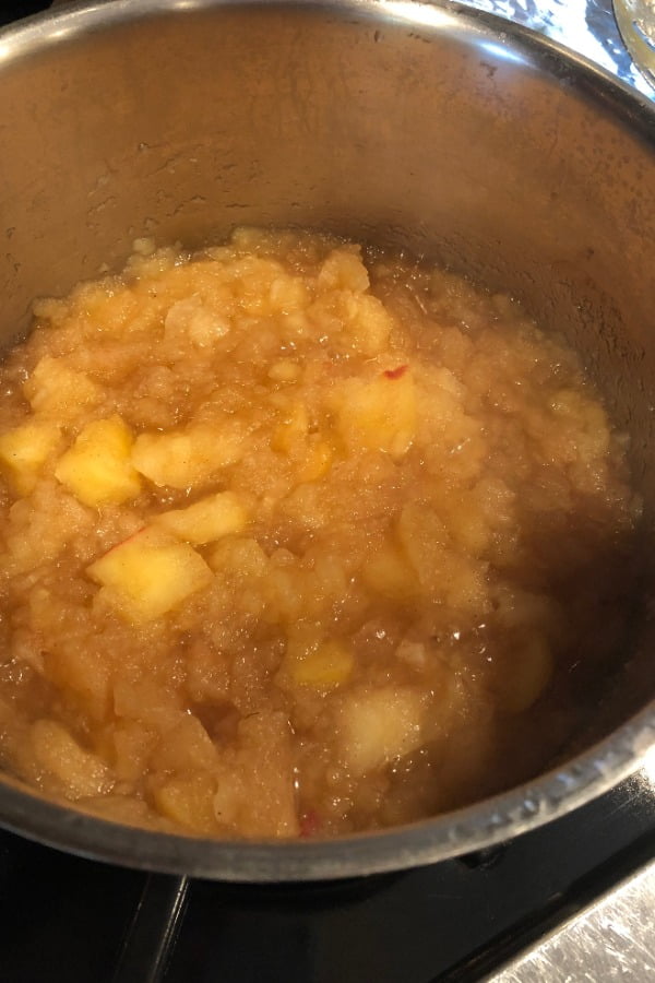 pot with cooked applesauce