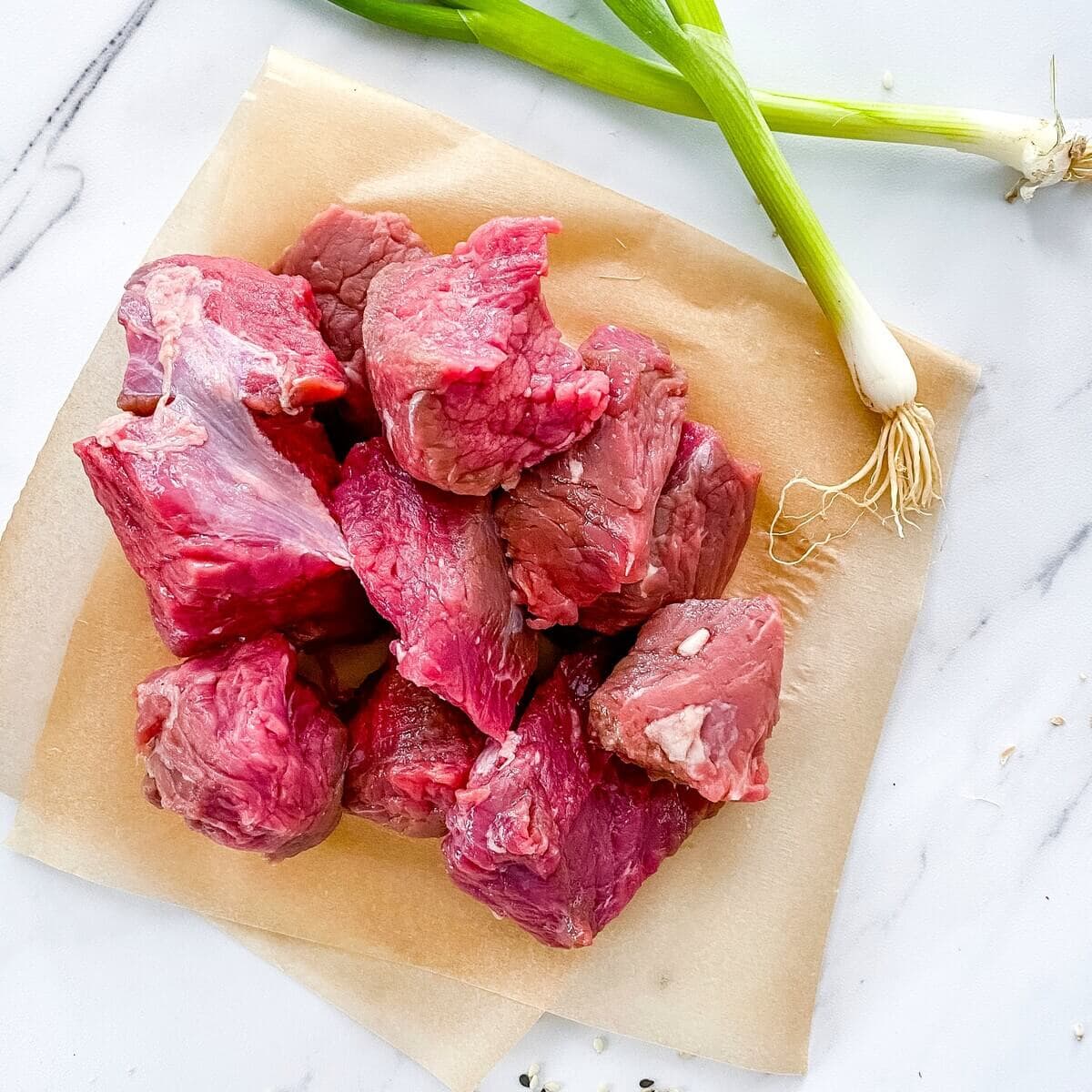Beef stew meat cut in large pieces.