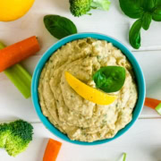 bowl of hummus with cut up veggies