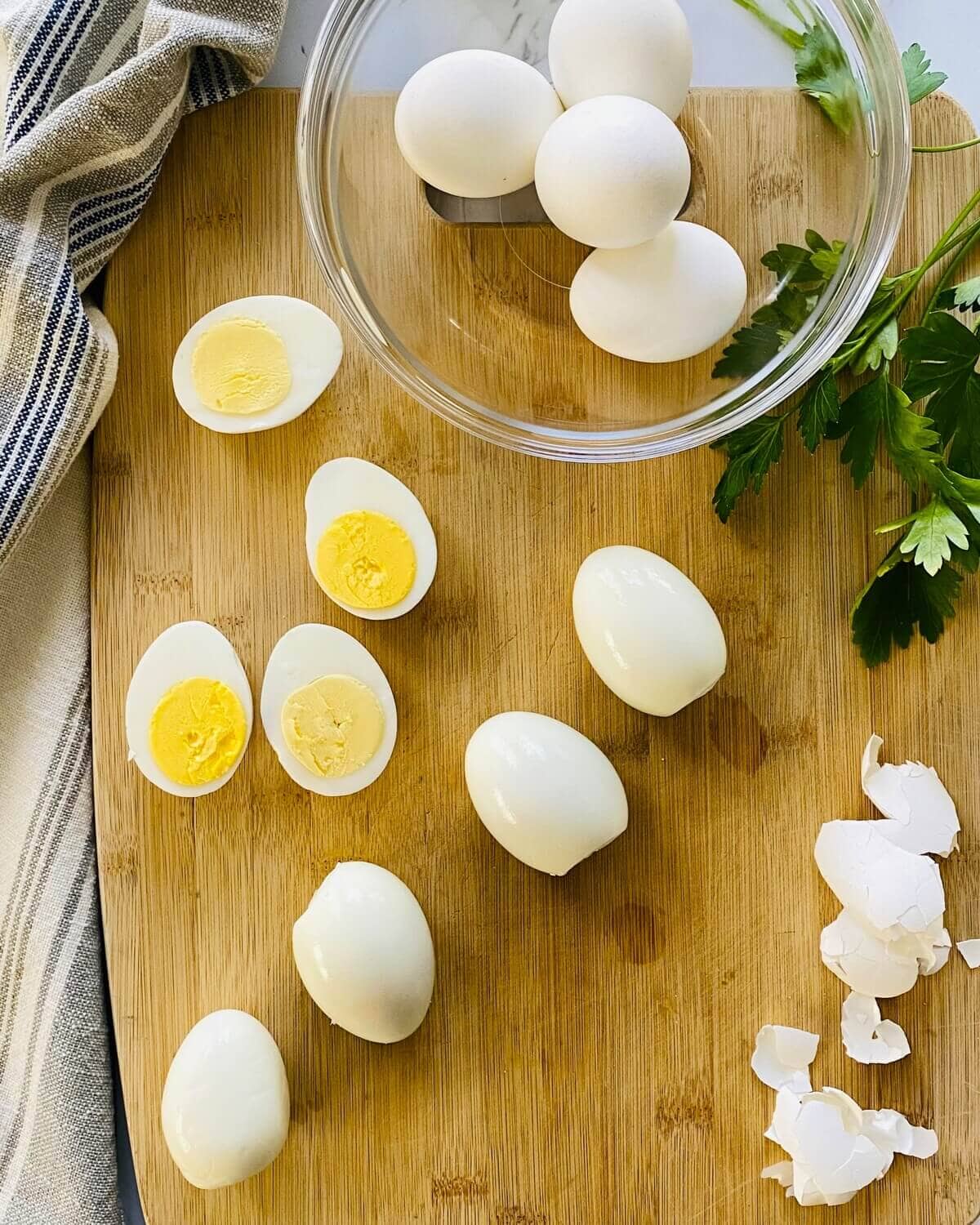 Peeled and cut hard boiled eggs for deviled eggs.