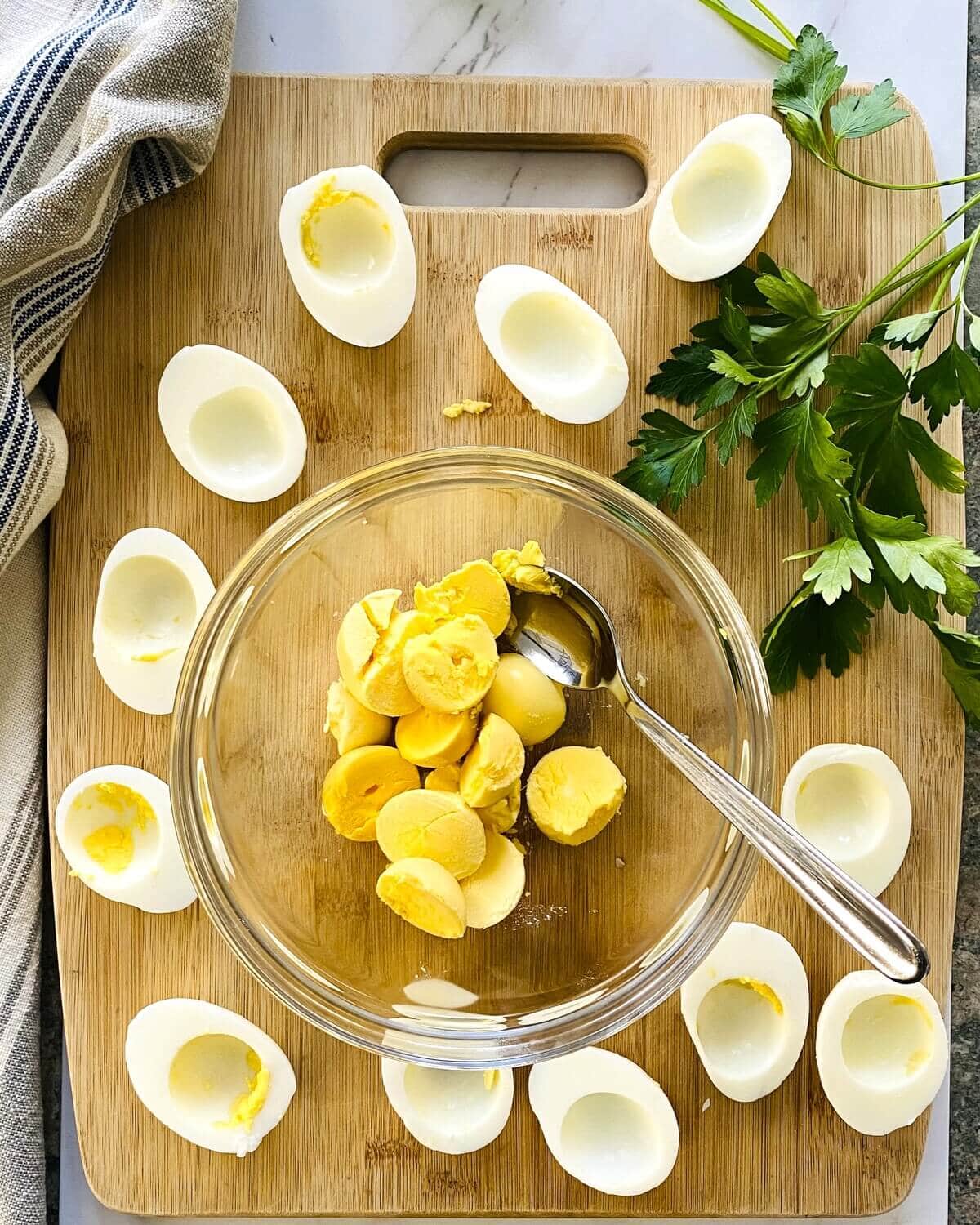 Hard boiled egg yolks and egg white halves.