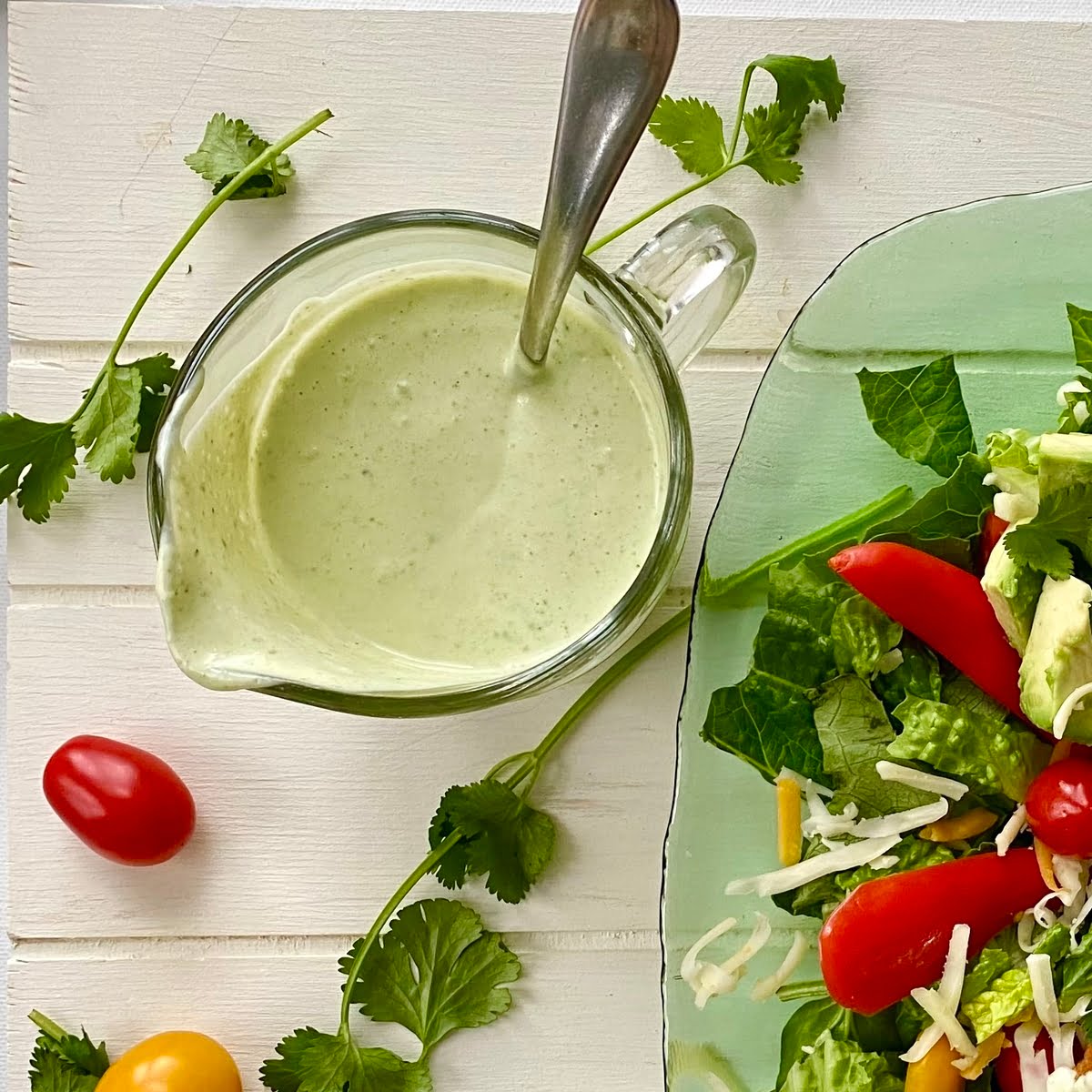 a pitcher of creamy cilantro lime dressing