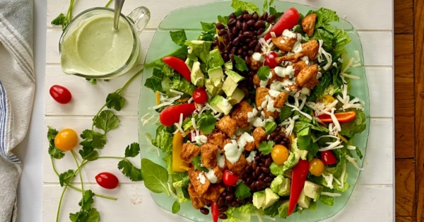 an entrée Southwest Salad with chicken and lots of veggies