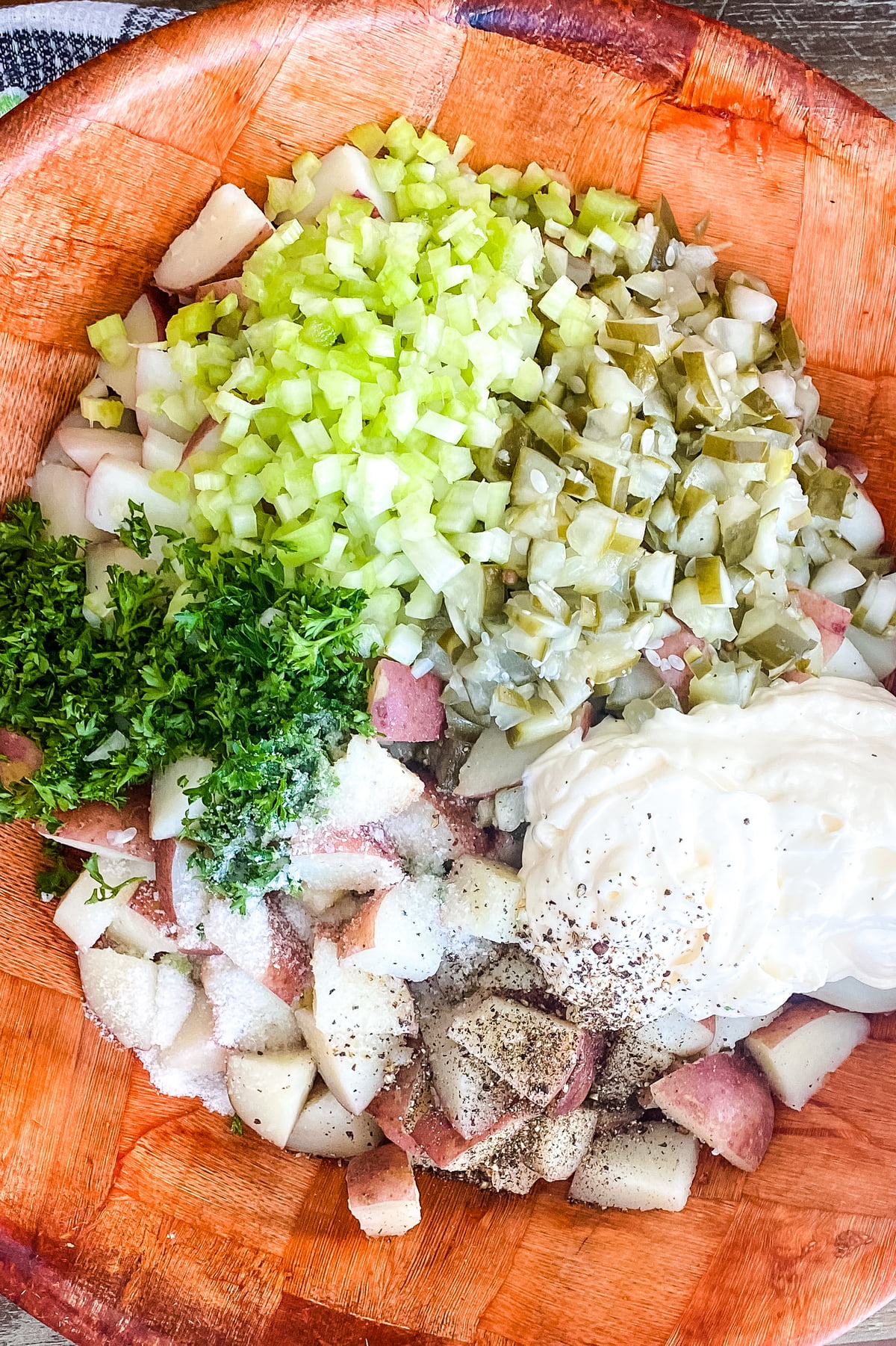 red potatoes, celery, mayonnaise, dill pickles, parsley, kosher salt and pepper