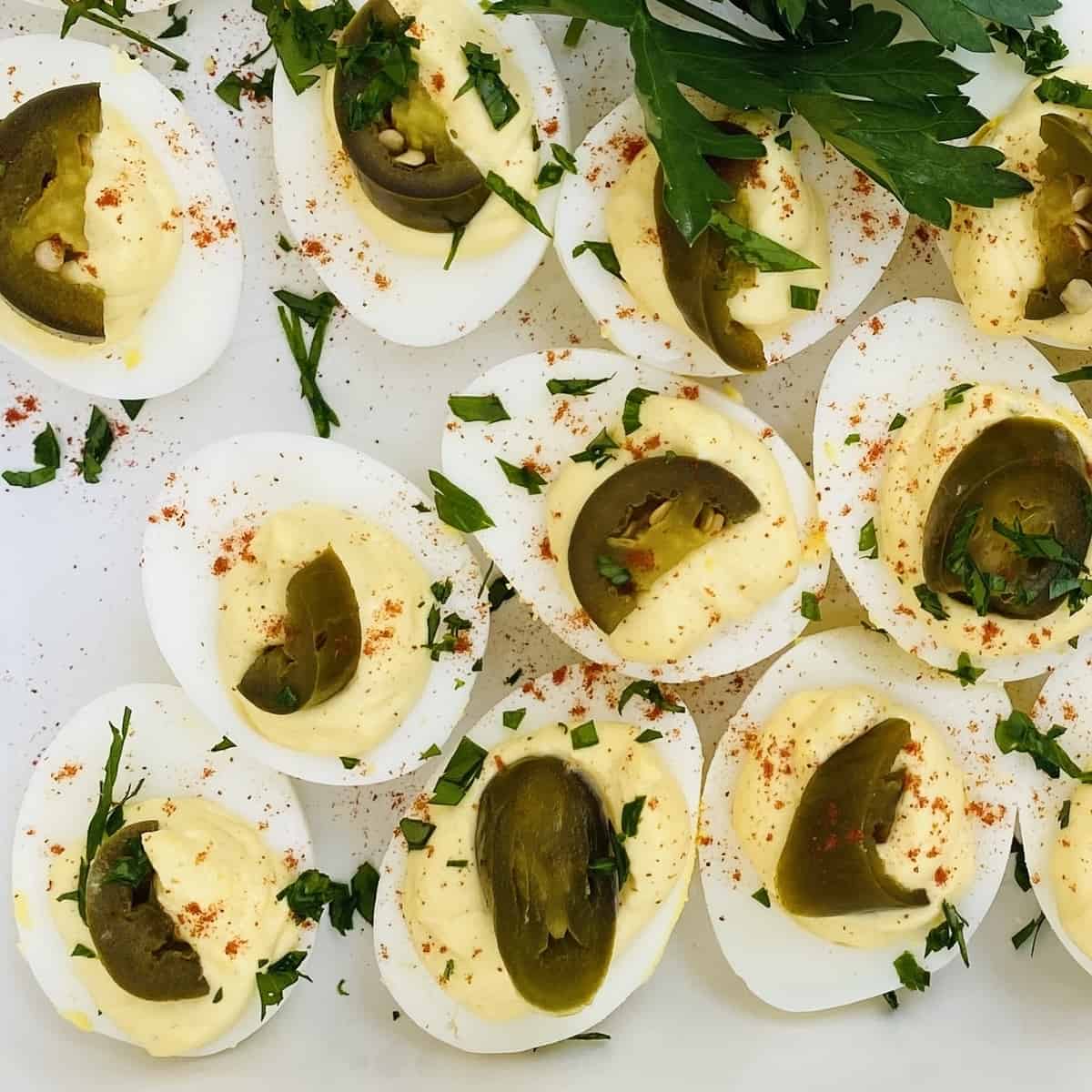 hard boiled eggs made into deviled eggs with jalapenos.