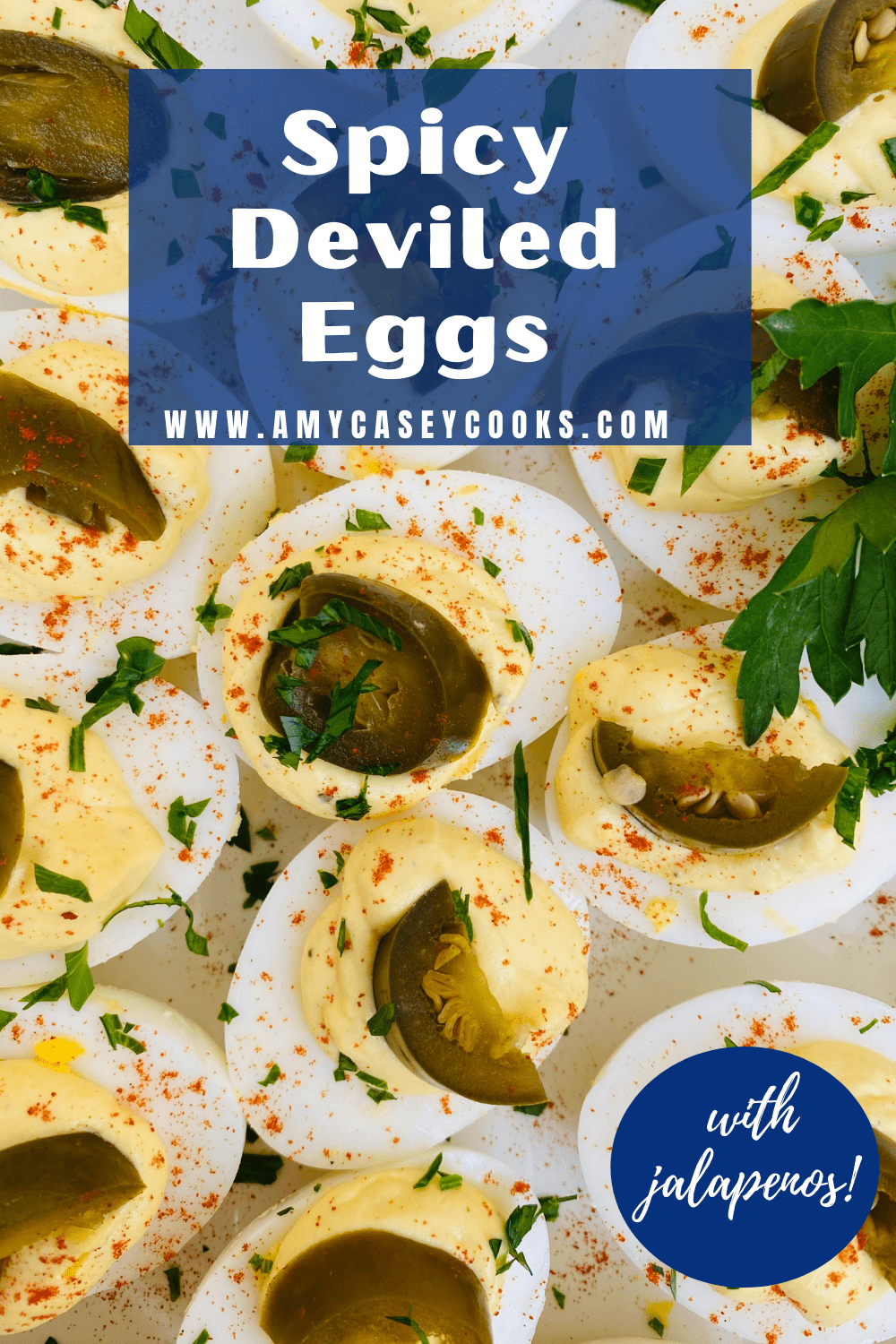 creamy and spicy deviled eggs topped with pickled jalapeno peppers