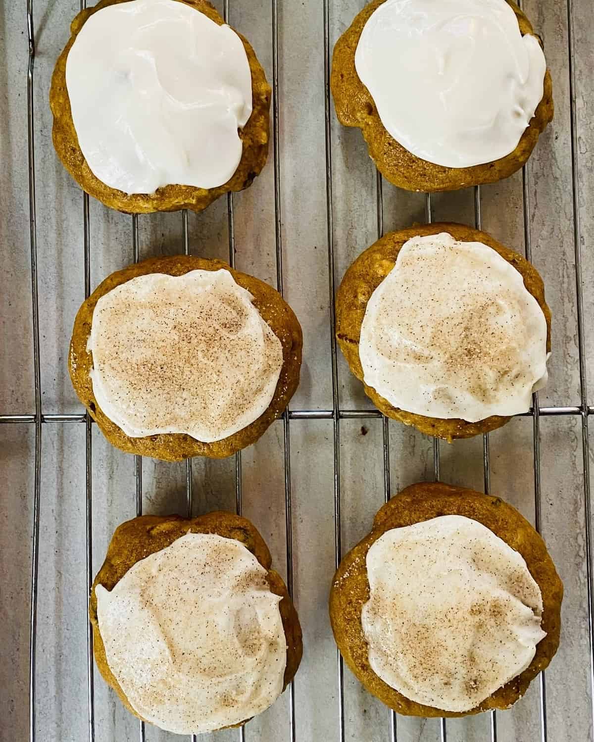 pumpkin spice cookies with frosting and cinnamon sugar
