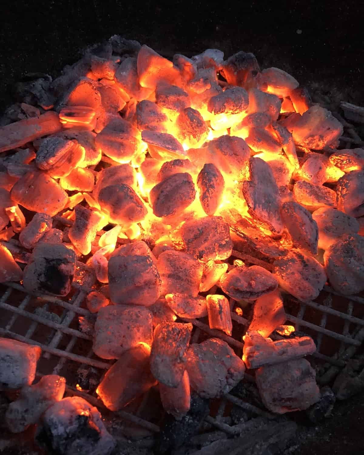 red hot charcoal in a grill