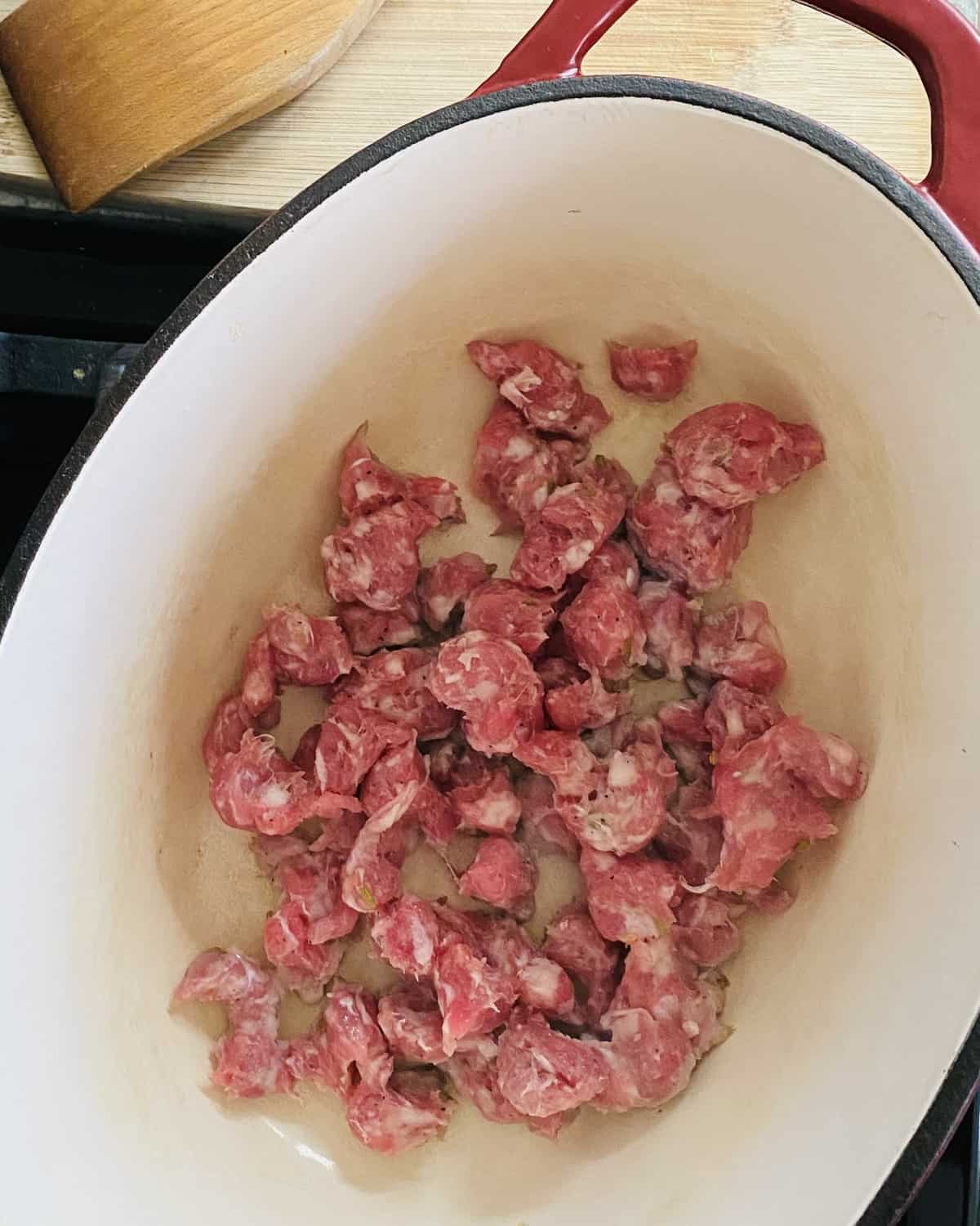 browning Italian sausage in a pot