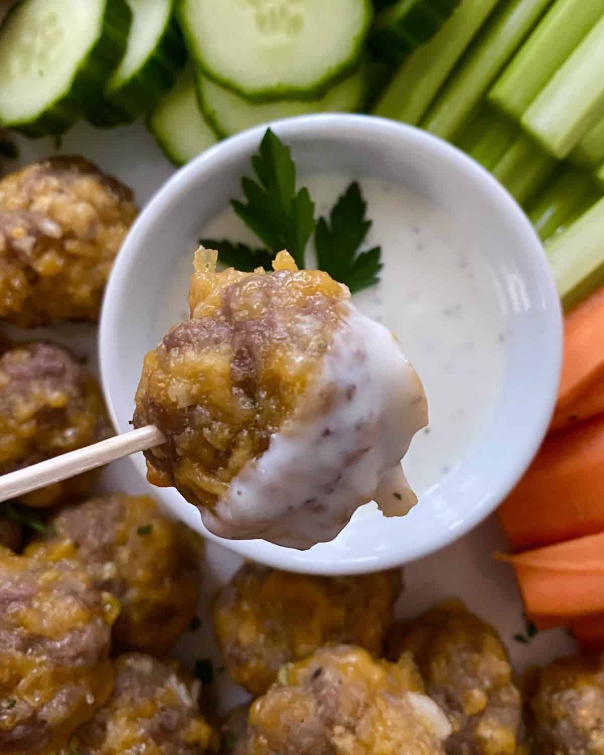 sausage cheese ball on a toothpick