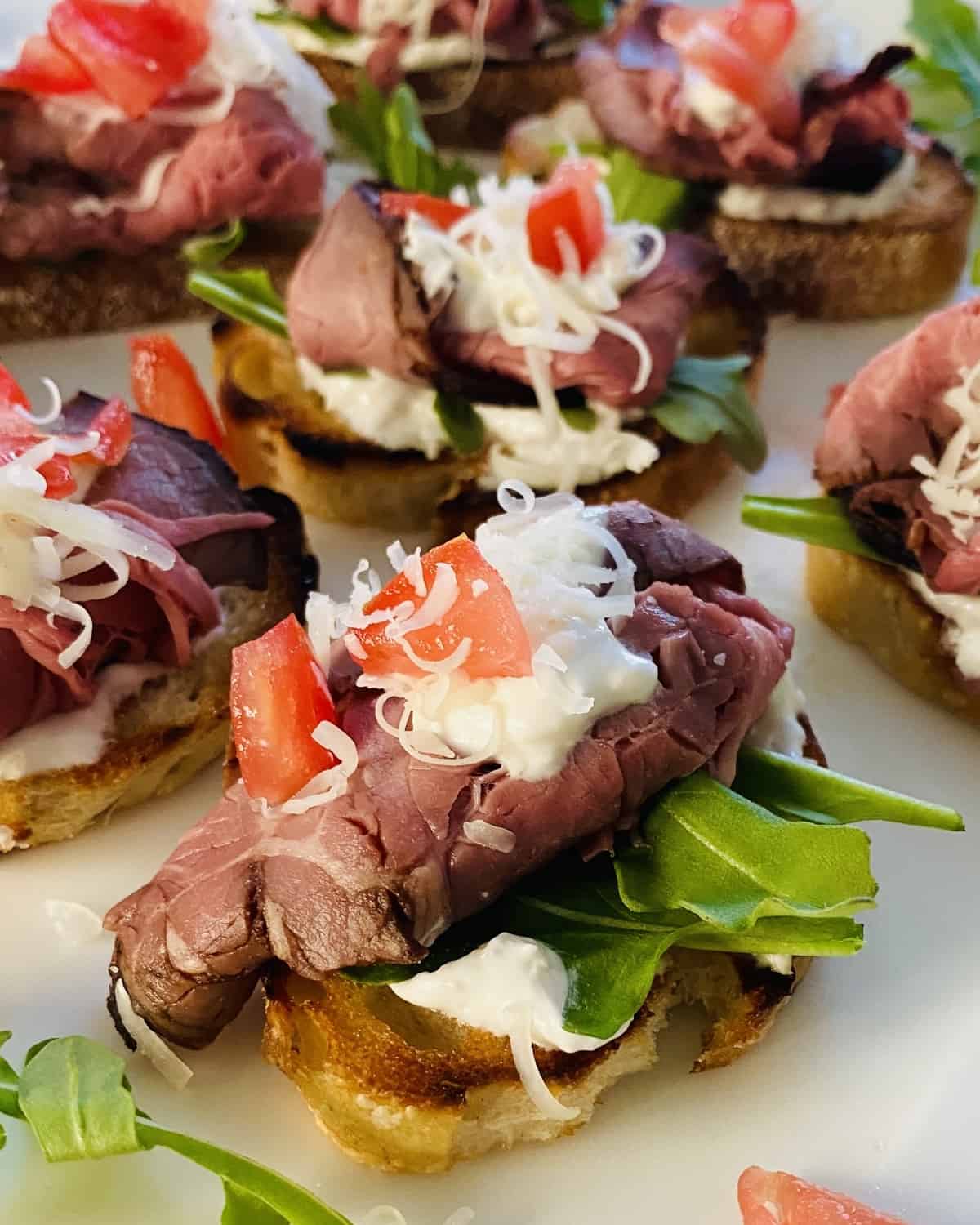 crostini topped with roast beef