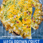 slice of ham and cheddar quiche with hash brown crust