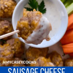 Sausage cheese ball on a toothpick and dipped in ranch dressing