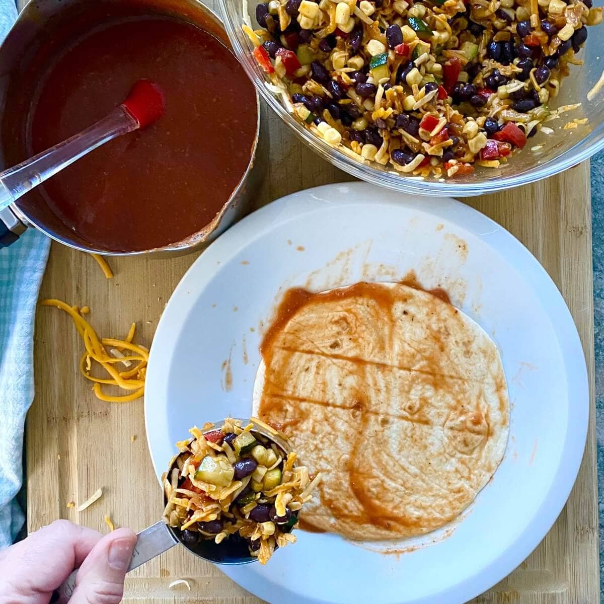 Filling for enchiladas and a tortilla.