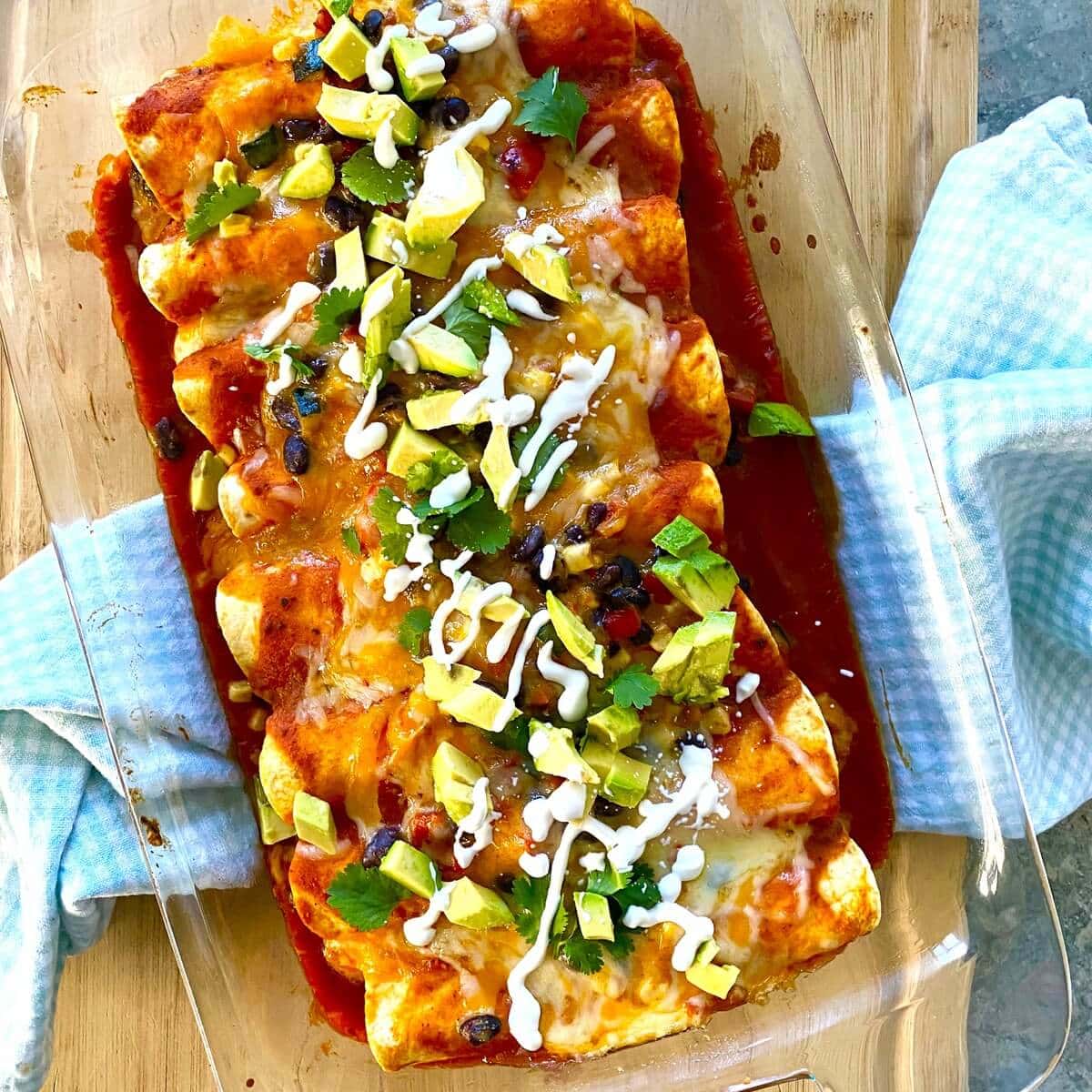 A pan a baked enchiladas.