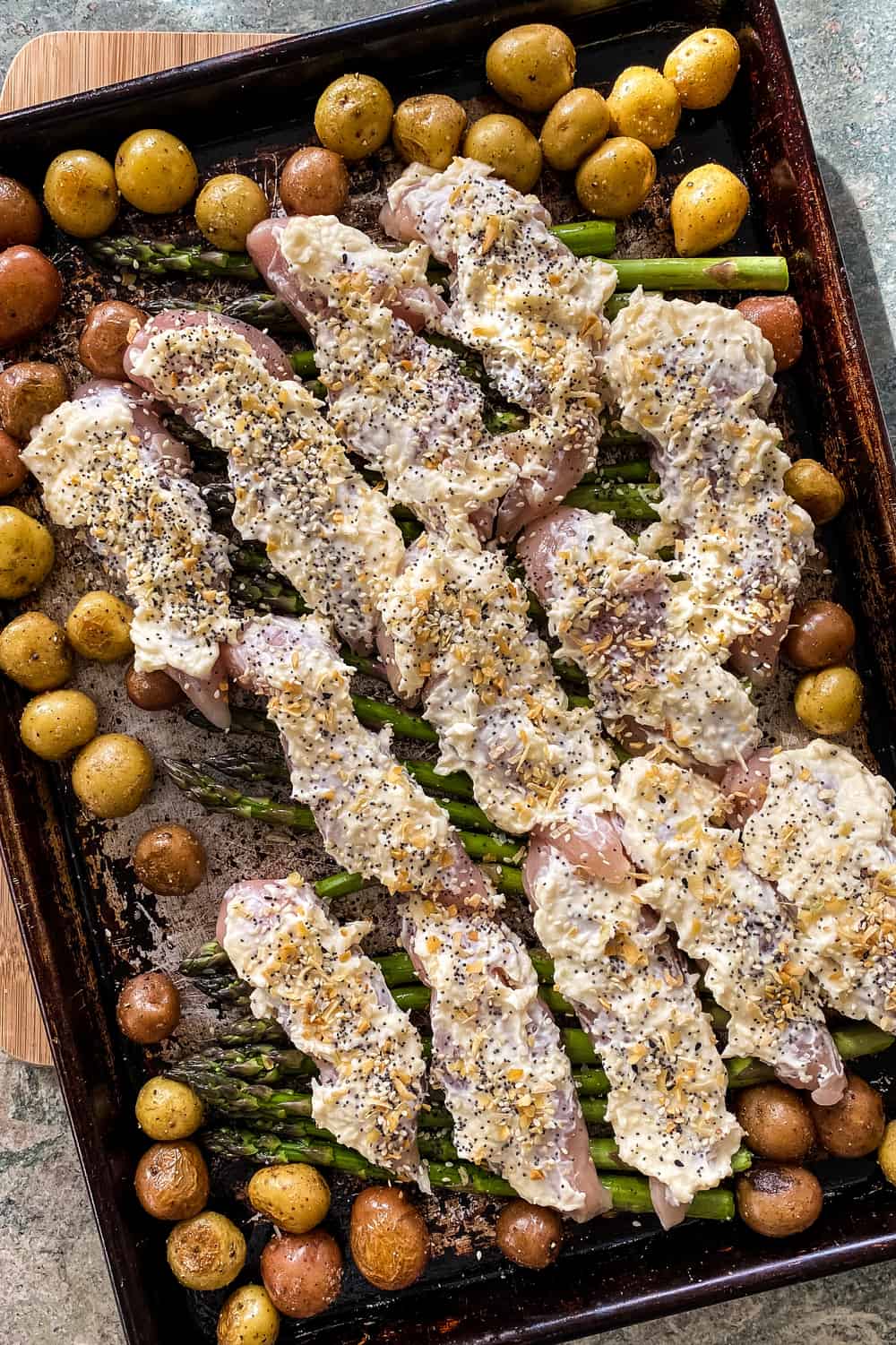 chicken tenderloins coated with Parmesan mayonnaise and everything bagel seasoning