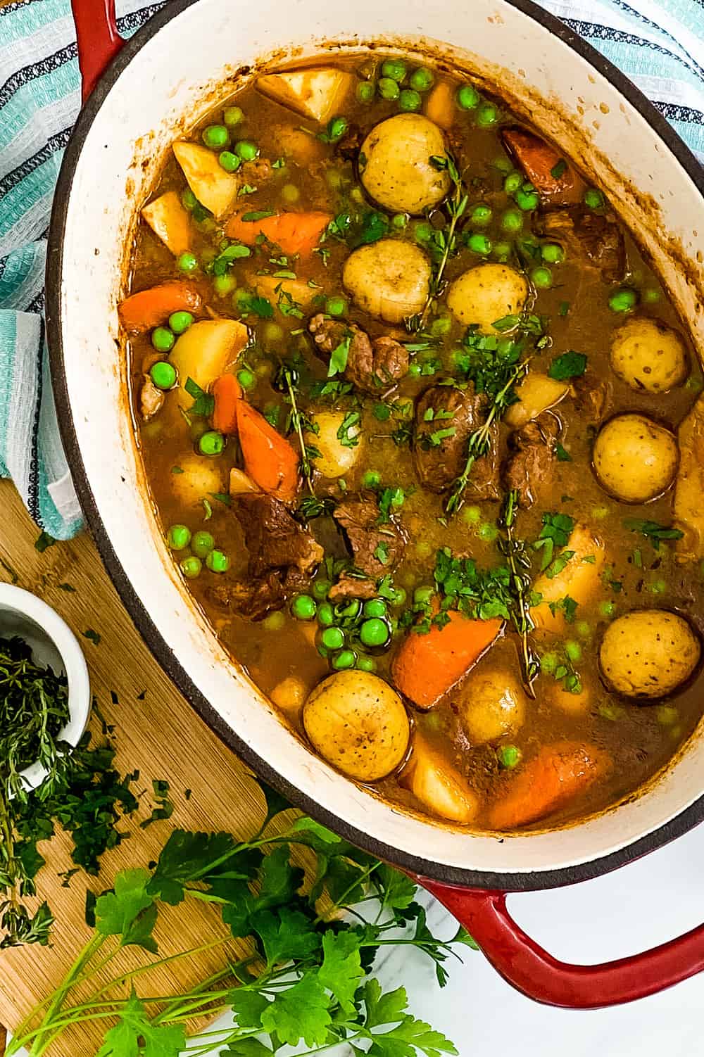 Dutch oven with stew with potatoes, carrots and lamb