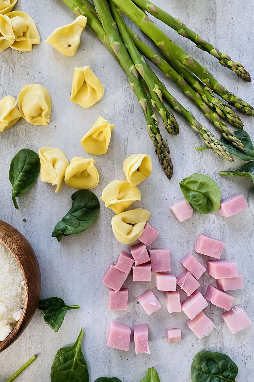 diced ham, asparagus, baby spinach, tortellini pasta, Parmesan cheese