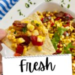 Sweet corn salad on a tortilla chip.