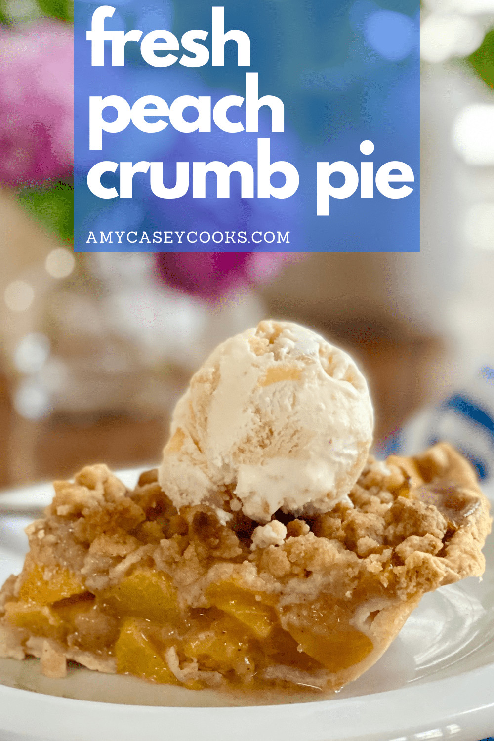A slice of peach crumb pie with ice cream.