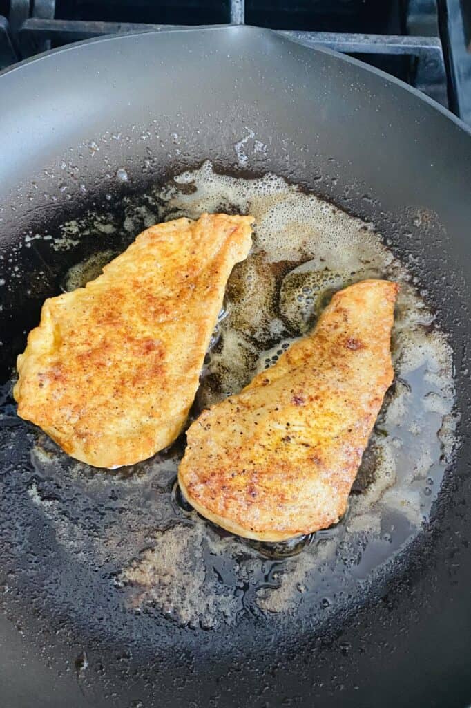 Butter Sauteed Chicken Breast with Fresh Tomato, Wine and Basil Sauce