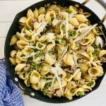 a family style serving of pasta and peas