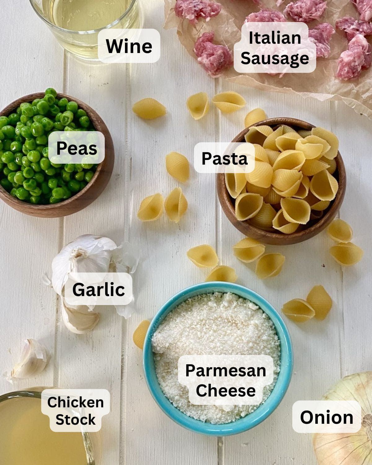 Peas, pasta, parmesan cheese, onion, garlic, Italian sausage, chicken stock for pasta and peas.