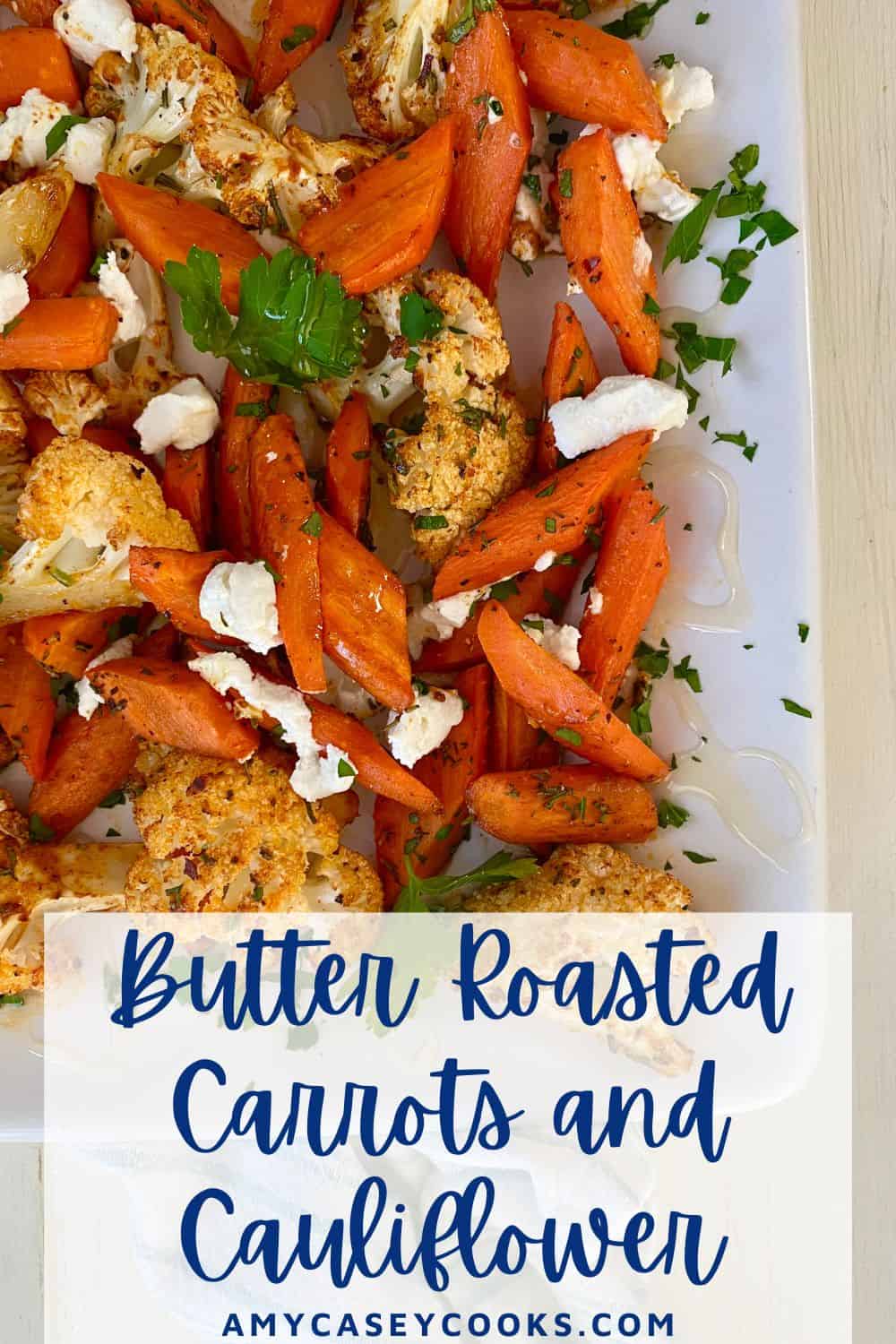 roasted carrots and cauliflower on a plate with goat cheese.