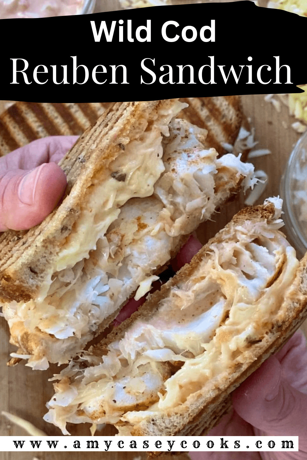 2 halves of a fish reuben sandwich.