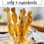 crispy cheese twists in glass.