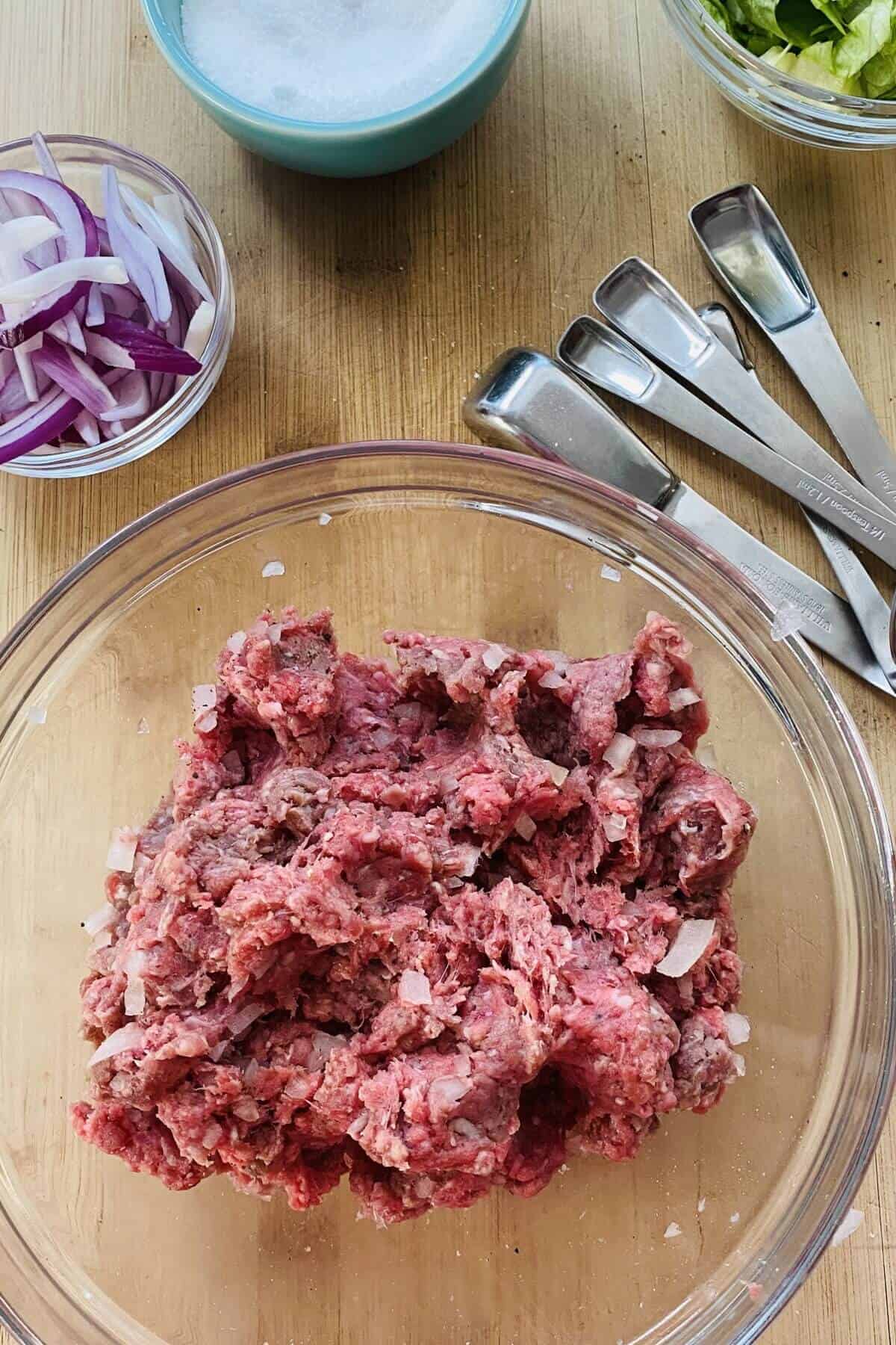 ground meat mixture for burgers.