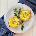2 egg cups on a plate.