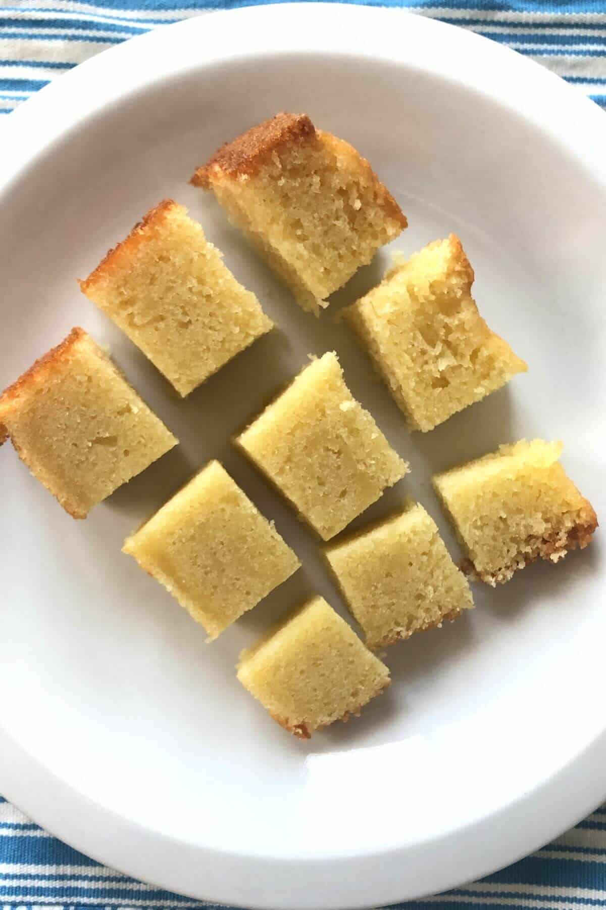 a slice of old fashioned pound cake cut in 9 squares.