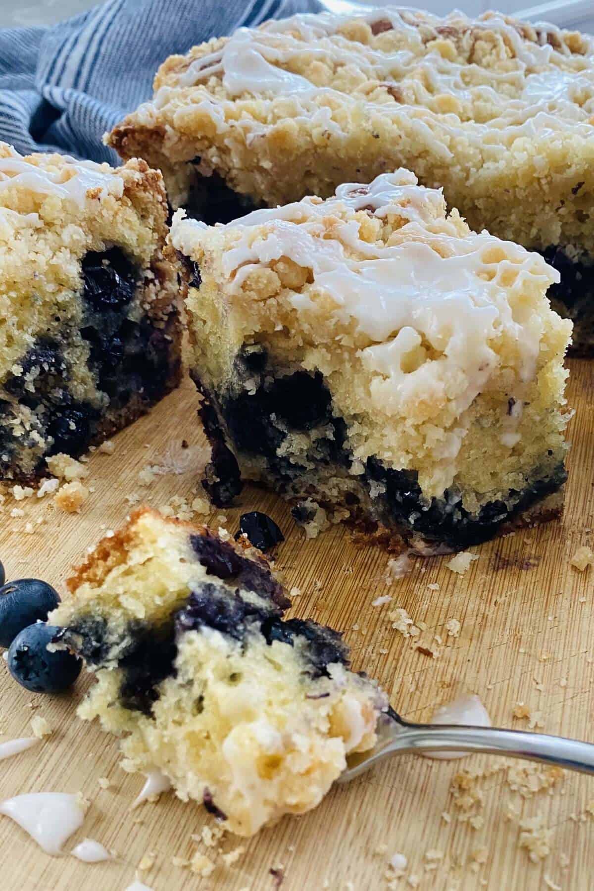 bite of blueberry muffin cake on a fork.