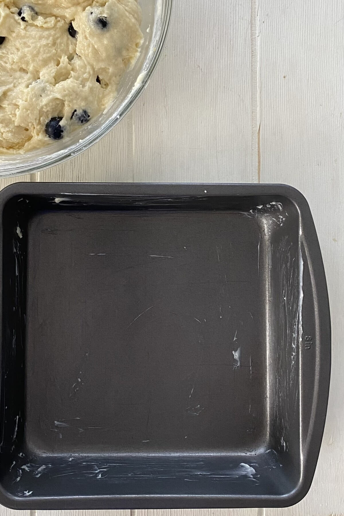 A greased baking pan.