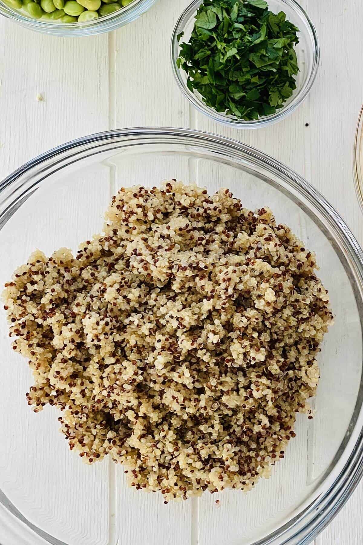 cooked quinoa in a glass bowl.