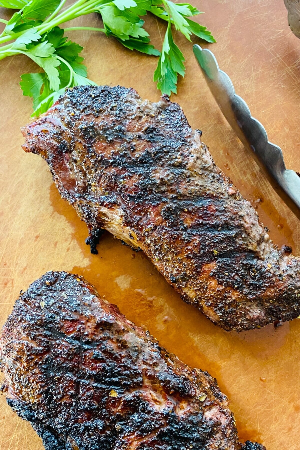 2 grilled steaks.